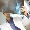 Doctor looking at pelvic Xray