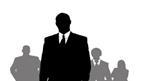 A silhouetted man standing out from the crowd