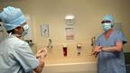 Two doctors in scrubs