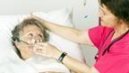 Woman patient with oxygen mask