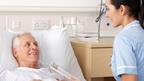 Nurse and clip board and patient