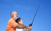 Older man and woman fishing