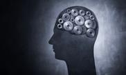Conceptual image of head filled with cog gears