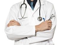 A doctor with arms folded