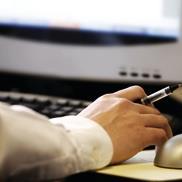 man using computer at work