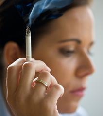 A young girl smoking