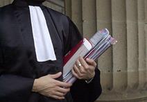 A barrister carrying law files