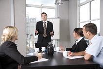 A meeting room with boardroom managers in
