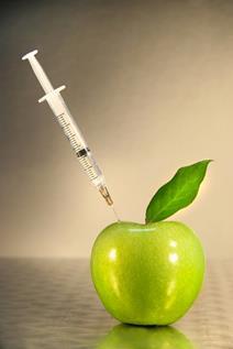 Apple injected with syringe