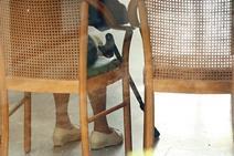 Old woman sitting in chair