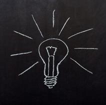 A lightbulb drawn in chalk on a chalkboard