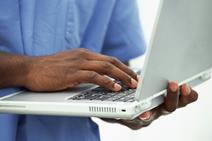 Clinician using a laptop computer