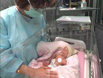 Premature baby in incubator