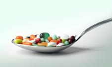 Pills on a spoon