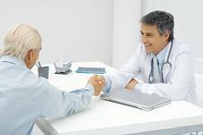 Older person and doctor
