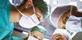 Surgery under way in operating theatre