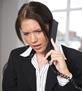 Lady on phone taking complaint