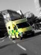 An ambulance driving along