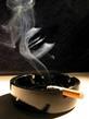A smoking cigarette in ashtray