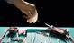 Surgeons hand reaching for scalpel