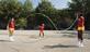 Girls skipping with two ropes