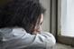 mental health depressed middle-age woman looking out of window