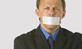 A man with tape over his mouth
