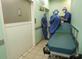 Three surgeons and a hospital trolley