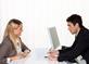 Manager and employee meeting in office