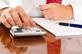 Office desk with finance calculator