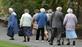 Elderly people walking about