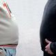 The stomachs of two large members of public