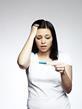 Girl looking at pregnancy test cannot BELIEVE she is pregnant