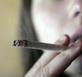 A young woman smoking