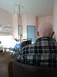 cancer patient alone in private treatment room