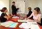 A work meeting around a table - people working collaboratively