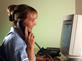Nurse on the phone to a patient using TELEHEALTH