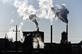 Industrial chimneys smoking with pollution
