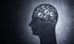 Conceptual image of head filled with cog gears