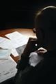 Chief executive looking at money bills problems