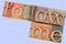 Letter press blocks spelling out "follow me"